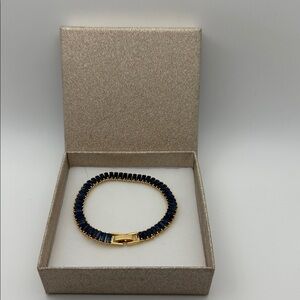 Elegant Sapphire Blue and Gold Tennis Bracelet